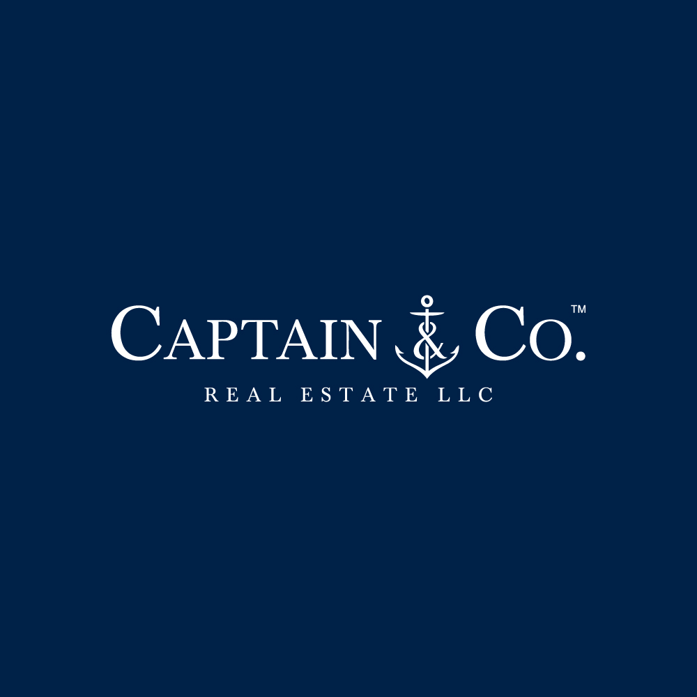Captain & Co Real Estate LLC Blue BG Logo